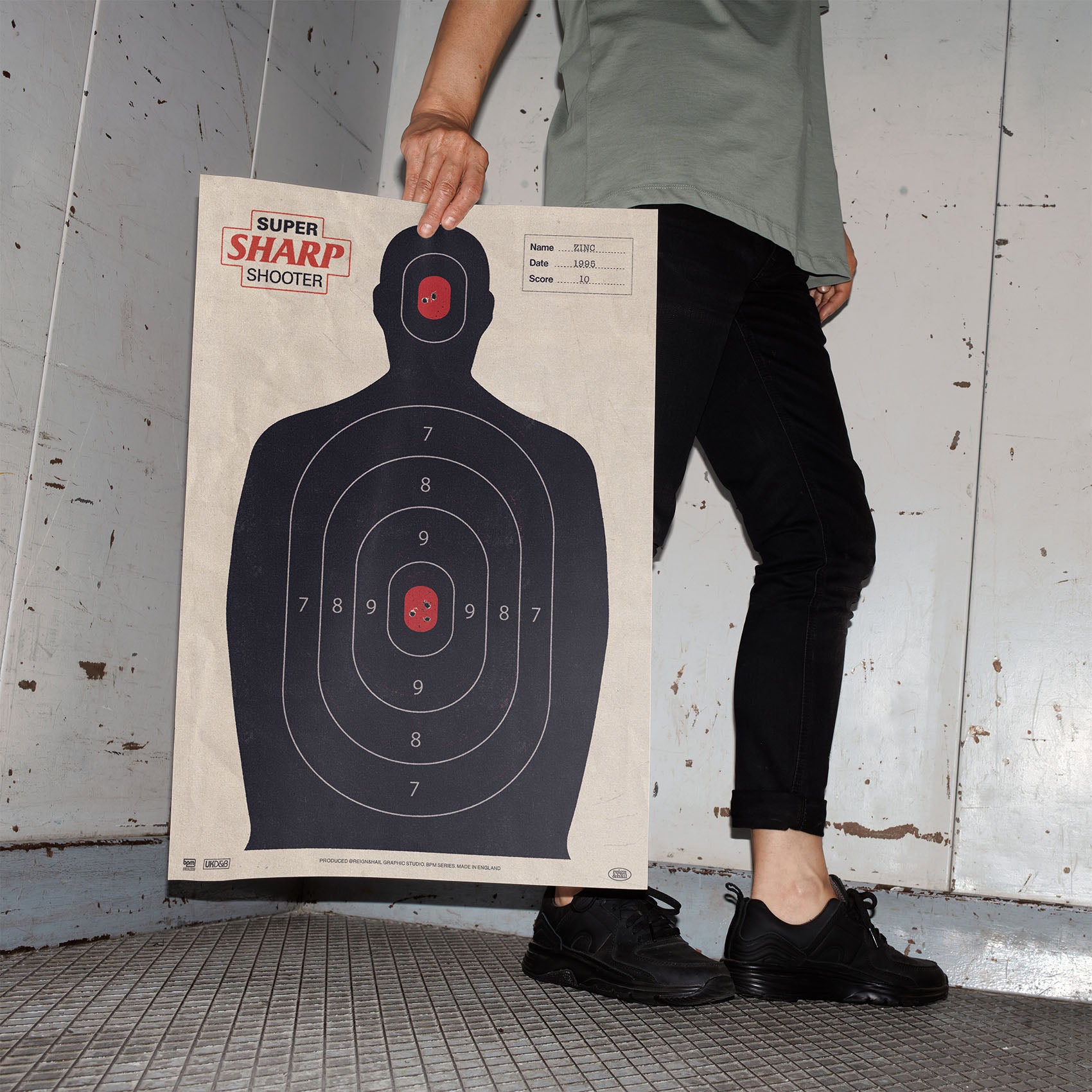 WOMAN HOLDING SUPER SHARP SHOOTER JUNGLE DRUM AND BASS POSTER